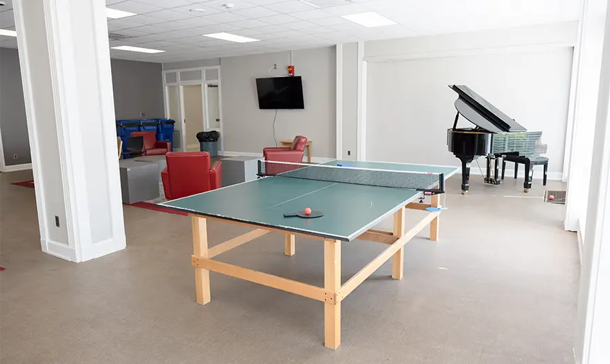 Parham 1st floor Community Room ping pong table and piano
