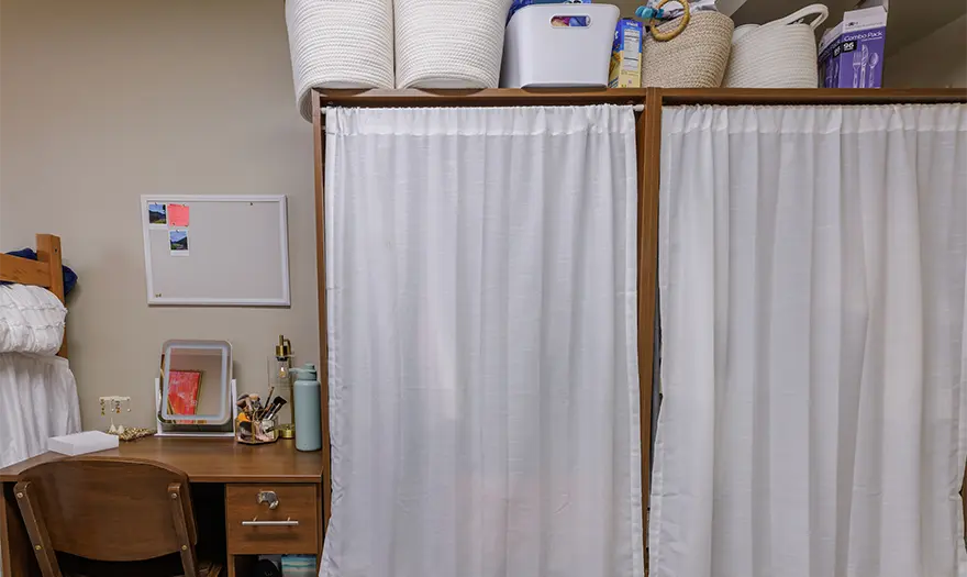 Paty Hall double-occupancy bedroom closet that's decorated