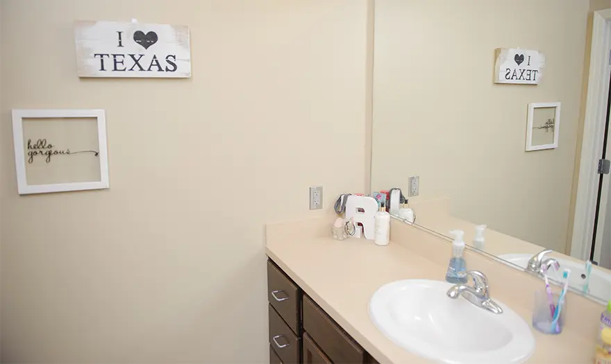 Presidential Village I bathroom vanity and sink