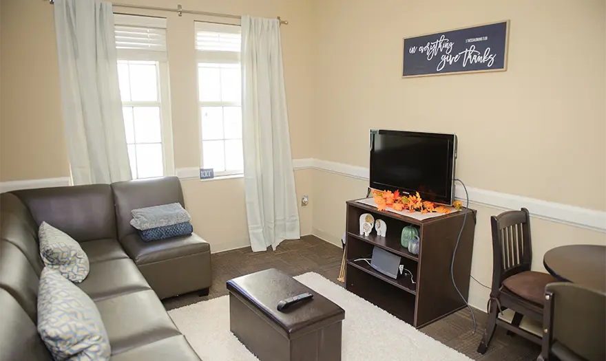 Presidential Village I suite living room