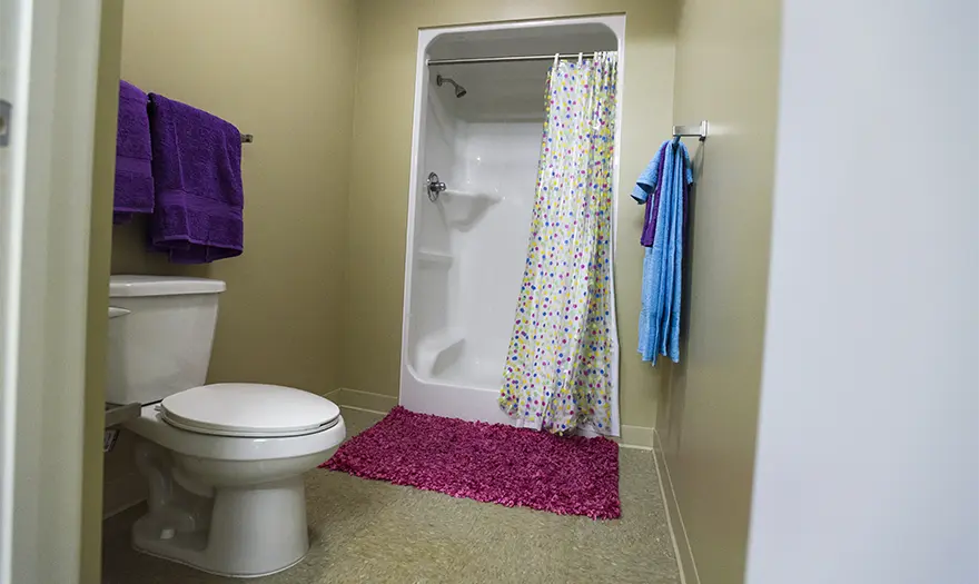 Presidential Village 2 suite bathroom that's decorated