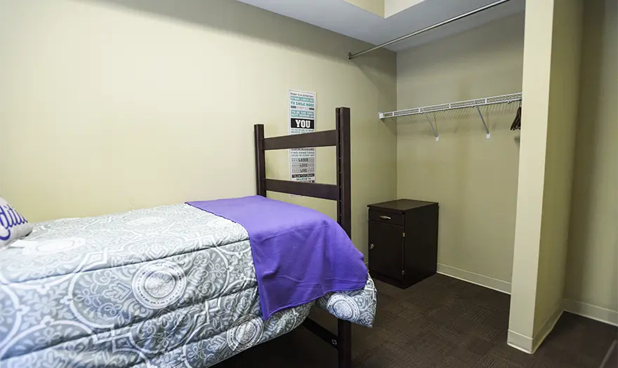 Presidential Village 2 suite bedroom that's decorated